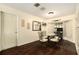 Cozy dining room with a glass table, decorative accents, and ample natural light at 5960 Boyette Rd, Wesley Chapel, FL 33545