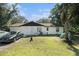 Charming single-story home with a well-maintained front yard and two-car garage at 5960 Boyette Rd, Wesley Chapel, FL 33545
