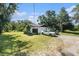 Lovely single-story home with a two-car garage on a sprawling lawn at 5960 Boyette Rd, Wesley Chapel, FL 33545