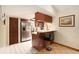 Functional kitchen with stainless steel appliances, a breakfast bar, and ample storage space at 5960 Boyette Rd, Wesley Chapel, FL 33545