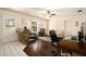 Bright living room featuring a bay window, comfortable seating, and a view of the outdoors at 5960 Boyette Rd, Wesley Chapel, FL 33545