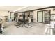 Spacious patio with outdoor dining set, with sliding doors and bay window at 5960 Boyette Rd, Wesley Chapel, FL 33545