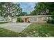 Charming single-story home with a well-maintained lawn and inviting curb appeal at 6345 Lambert Ln, New Port Richey, FL 34652
