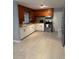 Well-lit kitchen features stainless steel appliances, ample counter space, and modern cabinetry at 6345 Lambert Ln, New Port Richey, FL 34652