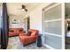 Cozy balcony with comfortable seating and sliding glass doors for seamless indoor-outdoor living at 6370 1St N St # 202, St Petersburg, FL 33702