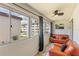 Relaxing balcony with comfortable seating and a view of the community pool and surrounding landscape at 6370 1St N St # 202, St Petersburg, FL 33702