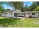 Spacious backyard with a patio and cozy outdoor seating, perfect for relaxation and entertaining at 6618 12Th N St, St Petersburg, FL 33702