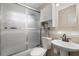 Bathroom featuring neutral tile, a shower over tub, and a matching vanity at 6618 12Th N St, St Petersburg, FL 33702