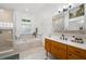 Spacious bathroom with a large soaking tub, separate shower, and a modern vanity at 6618 12Th N St, St Petersburg, FL 33702
