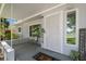 Inviting front porch with a decorative security door, house number, and a 'Welcome' sign at 6618 12Th N St, St Petersburg, FL 33702