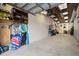 Spacious garage with ample storage, exposed ceiling, and concrete floor at 6618 12Th N St, St Petersburg, FL 33702