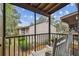 Relaxing balcony with rocking chairs, offering a peaceful view of the surrounding community at 7523 Pitch Pine Cir # 184, Tampa, FL 33617