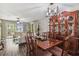 The dining area provides a charming view into the living room at 7523 Pitch Pine Cir # 184, Tampa, FL 33617