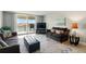 Spacious living area with water views and comfortable seating, perfect for relaxation and entertaining at 7625 Sun Island S Dr # 304, South Pasadena, FL 33707