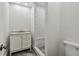 This bathroom offers a tiled shower with a seat, and a marble topped vanity at 816 9Th Sw Ave, Largo, FL 33770