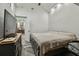 Bedroom featuring vaulted ceilings and view into the adjacent kitchen at 816 9Th Sw Ave, Largo, FL 33770