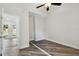 Bedroom featuring modern ceiling fan, wood-look floors, and recessed lighting at 816 9Th Sw Ave, Largo, FL 33770