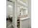 Hallway providing access to the bathroom and an adjacent bedroom at 816 9Th Sw Ave, Largo, FL 33770