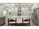 Bright kitchen with white marble island and stainless steel appliances at 816 9Th Sw Ave, Largo, FL 33770
