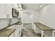 Modern kitchen with a stainless steel microwave and stylish wood countertops at 816 9Th Sw Ave, Largo, FL 33770