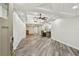 Bright and airy living room featuring modern flooring and fixtures at 816 9Th Sw Ave, Largo, FL 33770
