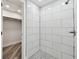 Walk in shower with glass door and tiled walls, and walk-in closet view at 816 9Th Sw Ave, Largo, FL 33770