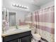 Bathroom features vanity with mirror, and shower-tub combination at 8208 Volusia Pl, Tampa, FL 33637