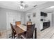 Dining room features view of backyard and access to kitchen at 8208 Volusia Pl, Tampa, FL 33637