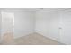 Bedroom features carpeted floor and an entry to the closet at 8521 N 29Th St, Tampa, FL 33604