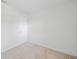 Small bedroom has neutral carpet and walls at 8521 N 29Th St, Tampa, FL 33604