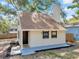 Charming exterior of a single Gathering home with a well-maintained yard at 8521 N 29Th St, Tampa, FL 33604