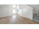 Bright and airy living room with tall ceilings and staircase at 8521 N 29Th St, Tampa, FL 33604