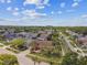 Aerial view of a residential neighborhood featuring tree-lined streets and well-maintained homes at 8601 Chadwick Dr, Tampa, FL 33635