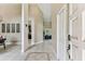 Spacious foyer featuring tile floors with decorative pattern and neutral wall paint at 8601 Chadwick Dr, Tampa, FL 33635