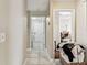 Tile flooring and neutral walls run the length of this hallway at 8601 Chadwick Dr, Tampa, FL 33635