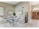 Spacious living room with high ceilings, a comfortable sectional sofa, and tile flooring throughout at 8601 Chadwick Dr, Tampa, FL 33635