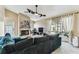 Inviting living room featuring a fireplace and access to a screened outdoor area at 8601 Chadwick Dr, Tampa, FL 33635