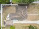 Bird's eye view showing home layout with backyard patio, detached garage, and the driveway at 914 E North St, Tampa, FL 33604