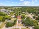 Overhead angle of the home and surrounding neighborhood, highlighting the community's tree-lined streets at 914 E North St, Tampa, FL 33604