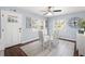 Stylish dining room with modern decor, a glass-top table, and ample natural light at 914 E North St, Tampa, FL 33604