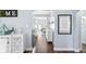 Open living space with wood floors, modern decor and lots of natural light at 914 E North St, Tampa, FL 33604