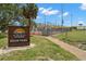Community park featuring a baseball field, playground, and green space at 9201 Captiva Cir, St Pete Beach, FL 33706