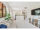 Bright bonus room with neutral colors, carpeted floors, natural light, and a view of the staircase at 925 Monticello N Blvd, St Petersburg, FL 33703