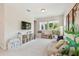 Bright bonus room featuring neutral colors, carpeted floors, natural light, and ample space for and entertainment at 925 Monticello N Blvd, St Petersburg, FL 33703