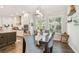 Dining room featuring lots of natural light, a dining table and chairs with hardwood floors at 925 Monticello N Blvd, St Petersburg, FL 33703