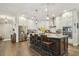 Gourmet kitchen with large island, stainless steel appliances, and custom cabinets at 925 Monticello N Blvd, St Petersburg, FL 33703