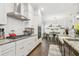 Kitchen area featuring modern stainless steel appliances, ample countertop space and wood flooring at 925 Monticello N Blvd, St Petersburg, FL 33703