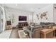 This living room is spacious, has tons of natural light, and features a beautiful decorative wall at 925 Monticello N Blvd, St Petersburg, FL 33703