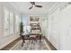 Bright office with modern design elements, a glass top desk, and lots of natural light at 925 Monticello N Blvd, St Petersburg, FL 33703