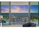 Balcony with seating offers stunning waterfront views and beautiful sunset at 100 1St N Ave # 2703, St Petersburg, FL 33701